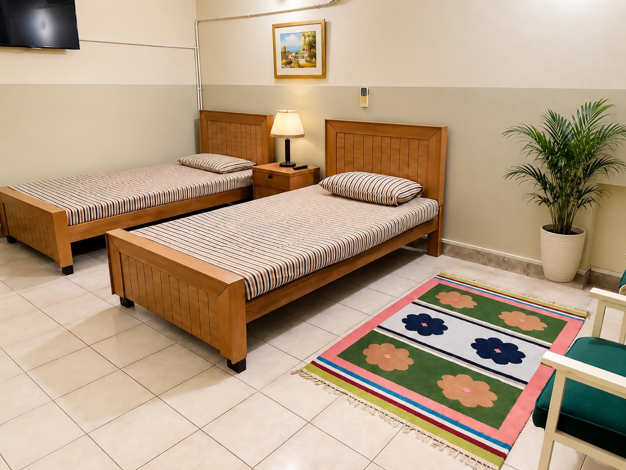 Twin-bed inpatient room at The Parklane Clinic psychiatric hospital in Lahore