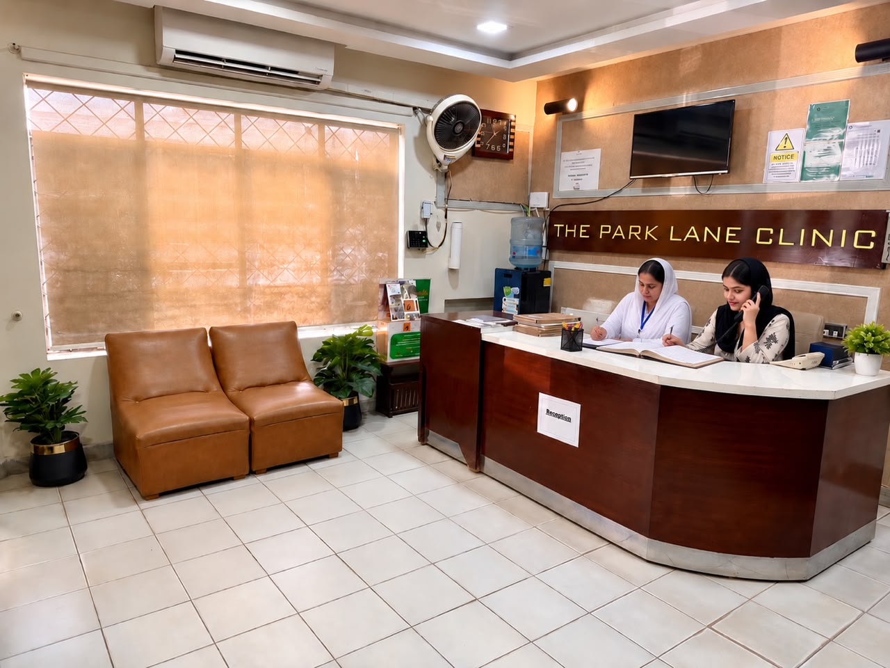 Reception desk and patient check-in area at The Parklane Clinic in Gulberg, Lahore
